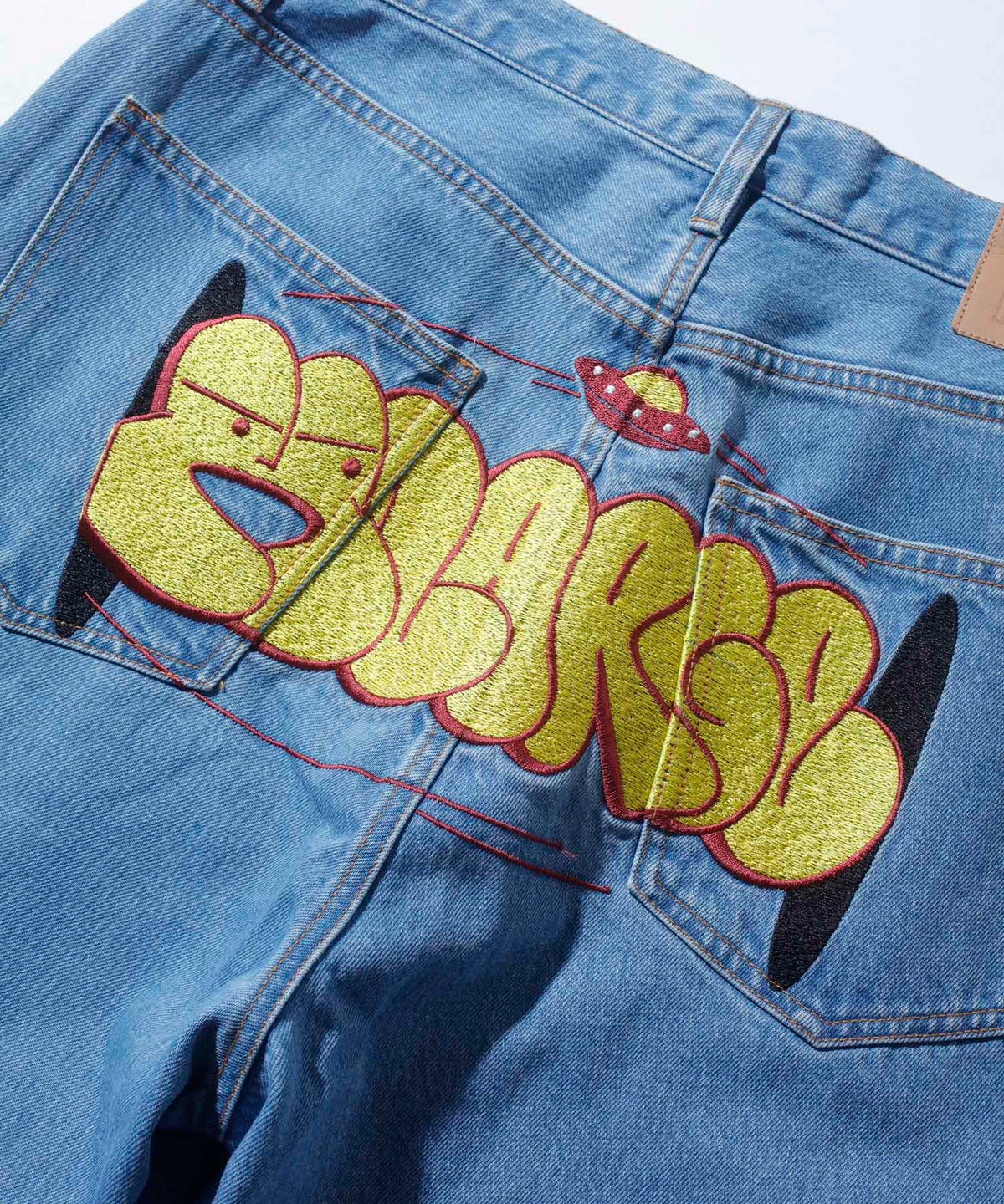 EMBROIDERY GRAFFITI DENIM PANTS