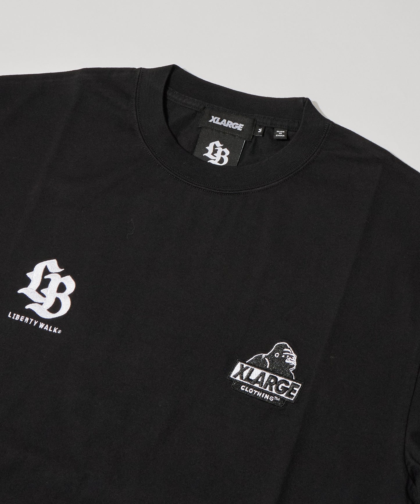 XLARGE x LIBERTY WALK S/S TEE
